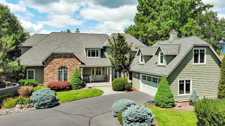 Fabulous Riverfront Home! Gorgeous views and prime location in this 2003 built Magallon custom home on the Rogue River. A stunning home on a half-acre with 22 ft vaulted ceilings, huge gourmet kitchen w/Wolff range and updated Kitchen Aid appliances. There are beautiful granite counters throughout, hardwood floors, new carpet in 2016 and new exterior paint in 2016. Architectural design and detail throughout with gas fireplace in the large living room, and sliders off the kitchen and living room to the deck overlooking the river. Large main floor master suite with a huge walk-in closet and separate quarters above the garage, perfect for an art studio, bonus room or separate guest room. Don't miss this Southern Oregon Retreat!