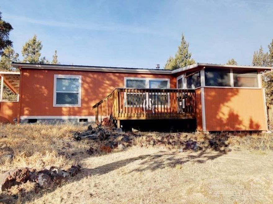 Looking for privacy, with still being close to town? This 1260 sq ft home with a large shop on 3+ acres is it. Lots of room for RV and toys. Open concept living with a large kitchen. Fenced in garden area with small green house. Subdivision has paved roads.