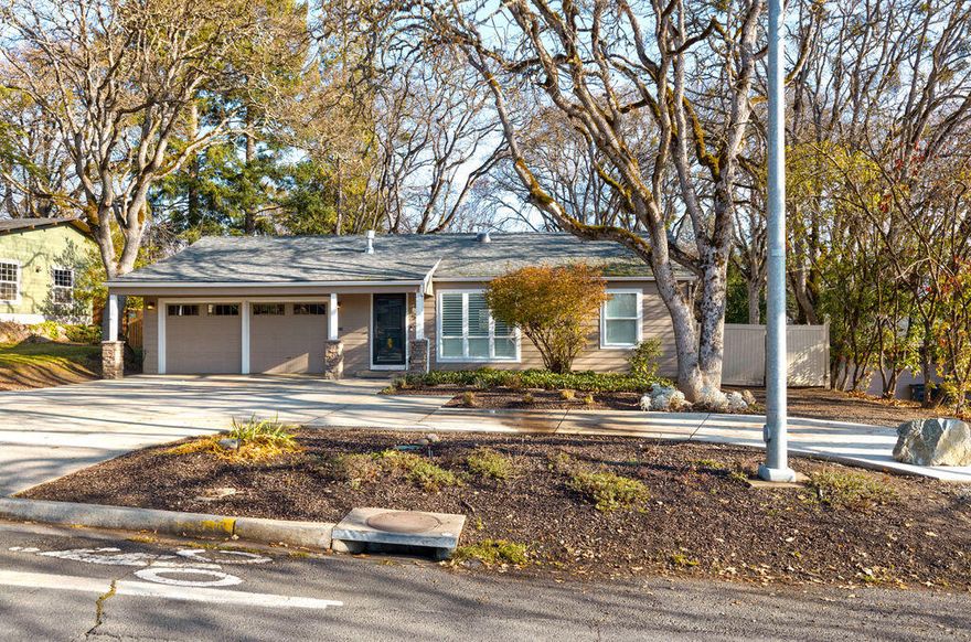 Rare opportunity!!-Single level fully furnished home, plus an additional Guest House in a highly sought after East Medford location. The Rogue Valley Country Club and Golf Course are just steps away w/a private entrance. This beautifully remodeled home is loaded with upgrades *custom built-ins'' contemporary fixtures and is prominently situated on a .37 acre fully landscaped lot. Very inviting home with an Open concept, Living Rm features vaulted ceilings, fireplace, Kitchen is fully remodeled with beautiful finishes. Nice formal dining area. Seller recently added an Amazing new Primary Suite with gorgeous vaulted ceilings, fireplace, access to the backyard, walk-in closet, primary bath features custom tile walls, floors & the walk-in shower, a free standing soaking tub, dual sinks and a water closet. 2nd bedroom also has an en-suite bathroom with custom upgrades. The 600sf guest house is currently used as a mid-term rental w/ its own private entrance and full living quarters.