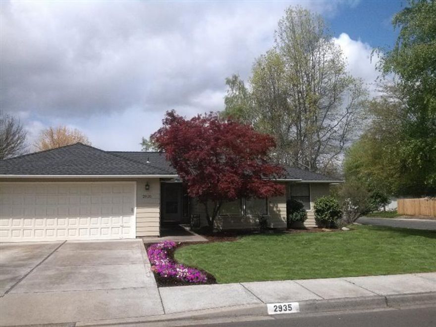 Nice corner lot, large yard and RV parking. New roof and paint in recent months. Patio and deck, in-ground times sprinklers. Newer flooring and paint inside.