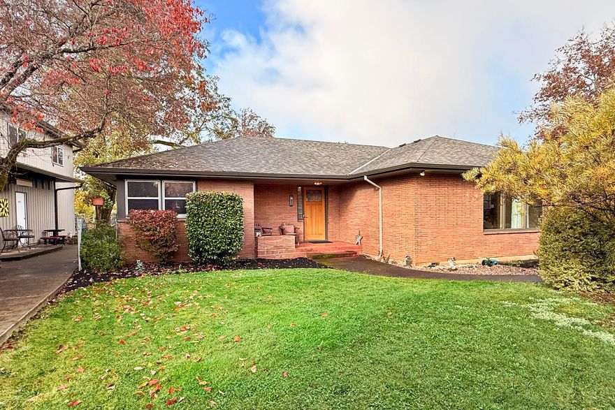 REDUCED PRICE!. Rare opportunity to live & work in the same location. This property has a large shop & home on same property. The shop is a 2516sf commercial building with 504sf second story office mezzanine built in 2011 with so many extras need to see for yourself. 20ft wide entrance door in front, 8ft side door along with 22ft high ceilings, heat & AC, large exhaust fan.  Owner spared no expense, need to check out all the extras the shop has to offer. Then step out of the shop into this beautifully restored 1956sf 3bdrm/2bath home with attached garage. Home has had many upgrades including newer roof, windows plumbing throughout, well & well components, newer exterior paint also restored oak flooring throughout the home. Gorgeous landscaping, lots of trees, shrubs & fruit trees. Property includes a tool shed, greenhouse/hobby room, RV hookup along with a completely fenced  backyard. Before scheduling a showing, potential buyers must be prequalified. Shown by appt