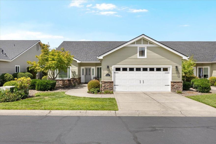 Beautifully updated home in the gated Poppy Village community! This 2 bed, 2 bath home with a versatile bonus room (perfect as an office, loft, reading nook, or theater) offers 1,946 sq ft of comfortable living. Enjoy sweeping valley views from the backyard and low-maintenance living with HOA that covers all front and back yard landscaping. Recent upgrades include new roof and exterior paint (2024), new carpet, fresh interior paint, and rich hardwood flooring. The kitchen boasts granite countertops, gas stovetop, custom cabinetry, and newer appliances. Vaulted ceilings add to the spacious feel with gas fireplace in living room, while the primary suite features a walk-in closet and updated finishes. Relax on the back patio or take advantage of close proximity to Eagle Point Golf Course. Turnkey and move-in ready!