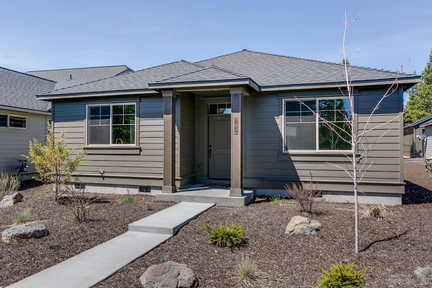 Only remaining NEW Single Level ASTORIA plan built by Pahlisch Homes! Well thought out design with open plan. Vaulted Great Room features a floor to ceiling gas fireplace with rock face & mantle. Kitchen includes quartz counters, knotty alder shaker style cabinets with Spanish Oak stain, an island with eating bar & Stainless Steel Whirlpool appliances. Master Bath has 2 sink vanity, tile floors & shower surround & large walk-in closet. Additional 4 ft width of storage in 2 car alley entry garage. High efficiency gas furnace, on city water/sewer. Community Clubhouse/Fitness Room/Paved Trails/Sport Court & More! This home is the Model Home: Open Fri-Sun, 12-5 p.m. or by appointment.