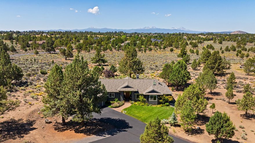 Enjoy sweeping mountain views, golden sunsets, and abundant natural light in this beautifully remodeled home. The 2020 renovation reimagined the primary suite with a spa-like bath featuring a walk-in shower, soaking tub, heated floors, dual vanities, and a heated towel rack. A former sleeping porch became a spacious walk-in closet. In 2021, slate was replaced with hickory wood floors; the kitchen and guest bath were updated with new counters, backsplash, fixtures, and appliances—including a wine cooler and range. The guest room features a versatile Murphy bed. A sunlit solarium is perfect for plant lovers, while built-in storage, artisan stained glass, and a vibrant front garden add charm. Located in a quiet, friendly neighborhood with a 1-2 mile walking path, this home blends modern comfort with timeless character.
