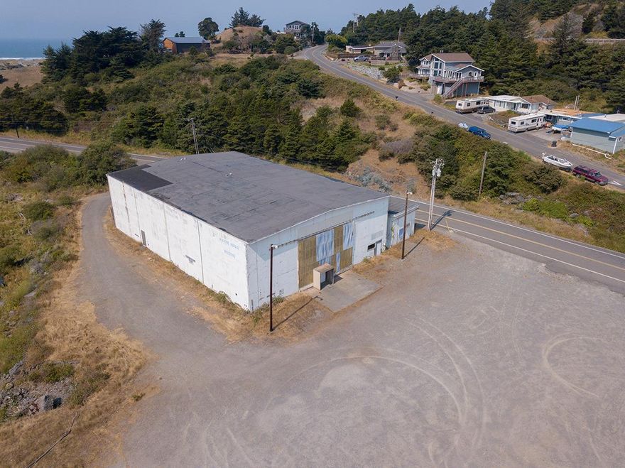 Great location for a hotel/motel or condos! Exceptional river frontage at the mouth of the Rogue River & Pacific Ocean. 9,600 sqft warehouse with 25 foot roll back doors and 40' ceiling available for sale or to lease at $2,400/month $28,000/year. Zoned C-1, along with MA/ER/NH. Parcels are nestled between Jot's Resort and Coast Guard Sub-station below Hwy 101. Easy access to highway. 5.20 acres