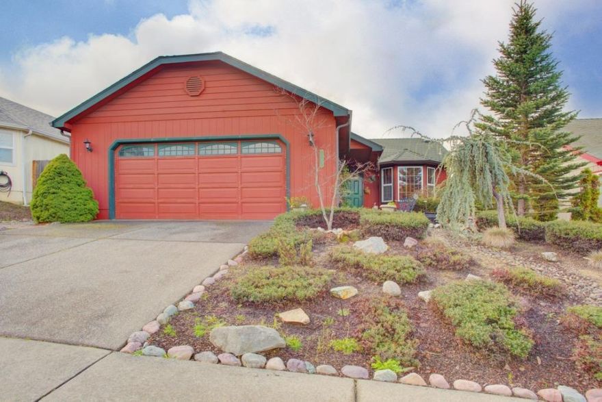 Ready to move? You'll be enjoying spring flowers in your new home if you call today! Just listed, contemporary in a wonderful neighborhood with city schools and city services! Light and bright, the living room features a large picture window, vaulted ceilings and plant shelves with outlets for accent lighting or to showcase your decorative displays. Dining room with glass doors to the patio, and a well designed kitchen and breakfast nook with bay window. Master Suite also features vaulted ceilings and plant shelves, a walk in closet and bathroom with shower. Guest Bedroom, main bathroom with tub/shower, indoor laundry, and an open den with window and closet that could be a 3rd bedroom with the addition of doors. Two car attached garage with opener, flowering shrubs, plants, established garden area with garlic, onions, parsley and room for more. Appliances and window coverings are all included, too! Well maintained and nothing to do except move right in!