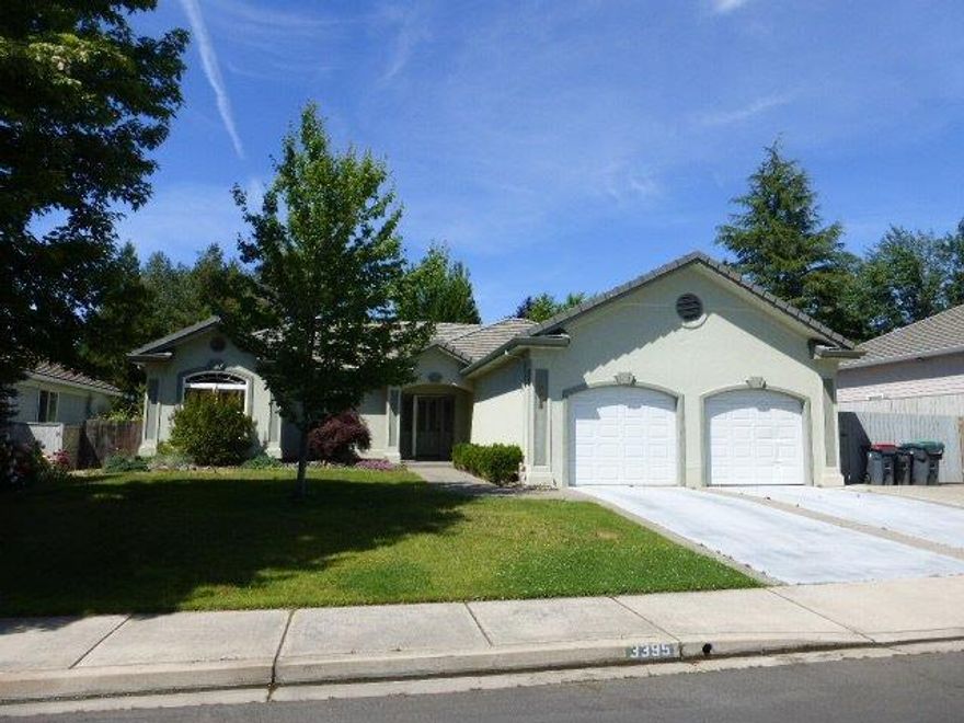 Located in the beautiful Alder Creek Subdivision. This well maintained home has a Great Room with vaulted ceiling, ceiling fan and gas fireplace. The Dining area is also vaulted with 2 skylights and a bay window providing lots of natural light. The Kitchen has granite countertops, gas range/oven, eating bar. Great Room, Dining area and Kitchen are open to each other and have beautiful hickory hardwood floors and custom painted walls. The Master has coffered ceiling with fan and walk-in closet. Bath has tile floors, double sinks, jetted tub and skylight. Two additional bedrooms- one with hardwood floor, skylight and walk-in closet- are on the opposite side of the house from the Master. The finished garage has lots of built-in cabinets. The backyard has a nice patio with a retractable awning to provide shade for outdoor entertaining and relaxing.