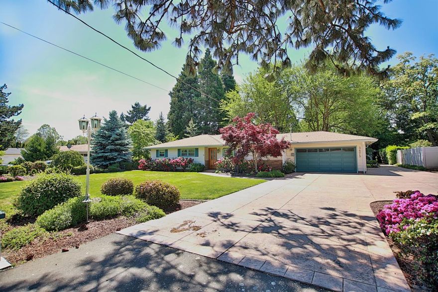 Gorgeous property in between Jacksonville and Medford in very desirable area. This beautiful home was completely remodeled in 1993 with crown moldings, refurbished wood windows, tile floors in the kitchen and bathroom, marble entryway, designer light fixtures and fans and new electrical and plumbing. Relax in the meticulously landscaped front and back yard complete with sprinkler system and lights on timers. Finish this off with stamped concrete patio, driveway and RV parking, heated shop and utility room. Come and take a look at this very special property today before it's gone!