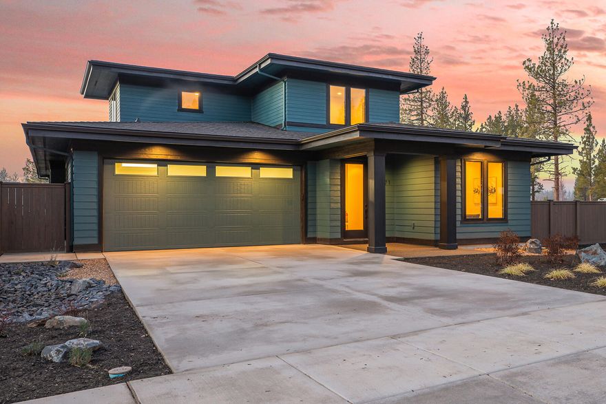 Don't miss this incredible West Bend modern prairie home by MCD in Talline! An ideal location offers easy access to Bend's West Side trails, parks, restaurants, schools, & more. A spacious  CORNER LOT features a sunlit, Westerly-facing great room with modern finishes & seamless indoor/outdoor flow to a covered deck and expansive yard—perfect for enjoying summer days. The chef's kitchen shines with floor-to-ceiling cabinets, premium JennAir appliances, & an oversized island w/ ample counter space for meal prep. Wide plank hardwood floors flow throughout the 1st floor & bonus rm. A luxurious main level primary suite boasts a soaking tub, heated tile floors in the spa-like bath & access to a second deck.  An additional room (or office) on the main & full bath could be used as an ensuite for guests.  The second story includes 2 bedrooms, a full bath, & a bonus/rec area. This is a TREMENDOUS VALUE for a quality West side home w/expansive outdoor living & access to the best of West Bend!