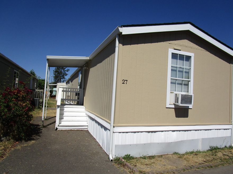 Really nice mobile home in Cascade Village Mobile Estates.  Built in 1991 this home features split bedroom floor plan; 2 bedrooms & 2 baths; open living room; kitchen with nice cabinetry & counter tops; fresh paint inside and out; great covered & enclosed side porch; plus carport. Appliances are also included.   This is an all age park.