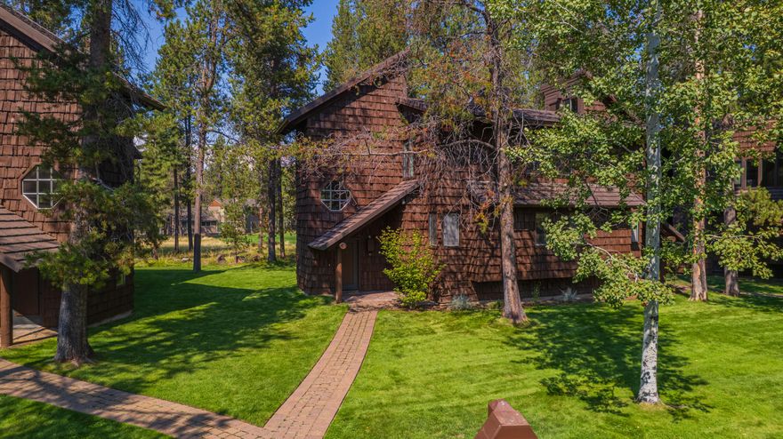 This updated Wildflower condo captures the essence of Sunriver living. Set along the Meadows Golf Course, it offers peaceful, tree-lined views from two private decks and easy access to The Village, The Lodge, The Cove, and Sage Springs Spa. Inside, the multi-level plan has been tastefully remodeled with a light, modern kitchen featuring updated cabinetry, counters, and appliances, plus refreshed baths with new vanities and fixtures. Two bedrooms, two full baths, and two lava-rock gas fireplaces create inviting spaces for gathering and relaxation. Additional updates include a highly efficient heat pump/AC with programable thermostat, new flooring, lighting, window coverings, and furnishings. Offered fully furnished, this Wildflower condo blends comfort, convenience, and classic Sunriver charm—an ideal retreat or investment.