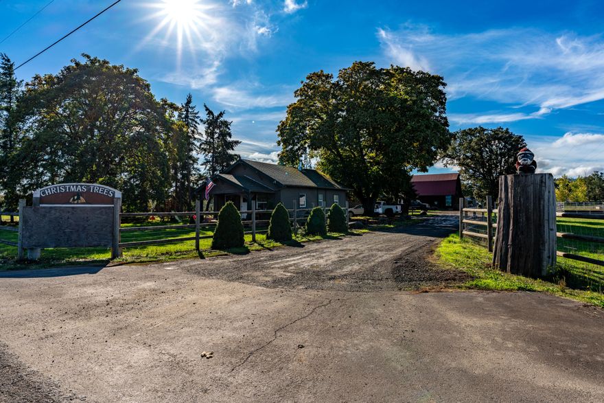 This 35-acre farm presents a number of options for generating income, including a prosperous Christmas tree farm and a seasonal holiday retail business that is gaining popularity. In addition to the nicely maintained primary farm house there is a legal duplex w/ five garages, offering long-term opportunities with the flexibility to rent out on a short or long-term basis. Lastly, the six-bay shop is a fantastic space for your projects, tools, and toys, with concrete floors, a finished office, and mezzanine.