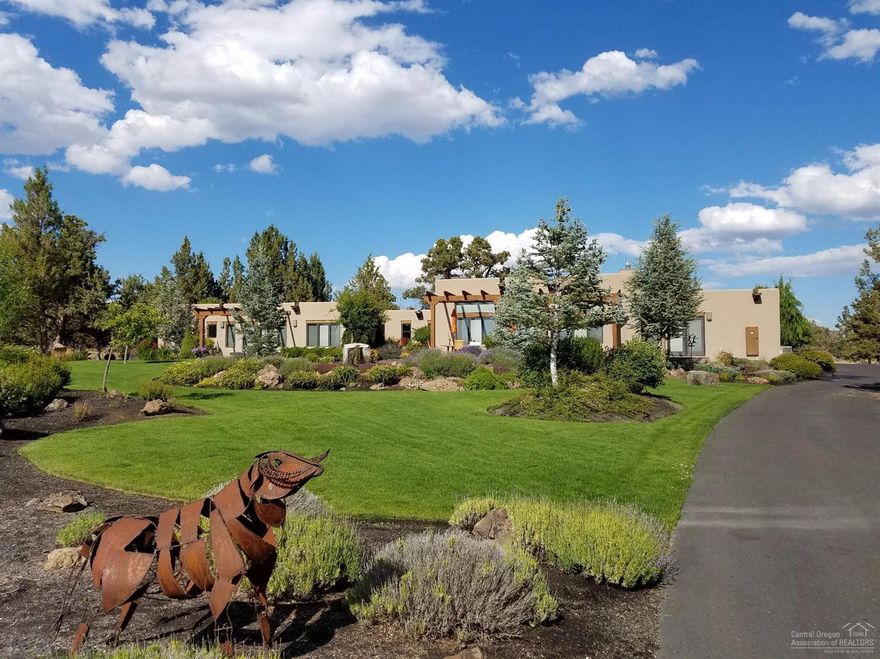 Southwest ranch home...Cascade Mtn views...privacy...Very comfortable 1 level living with expansive great room & dining w/views. Wonderful kitchen w/solid counters, Viking appliances, island & breakfast nook. Striking master suite wing w/ gas fireplace, luxurious bathroom, private patio & office/den. Guest wing w/2 bedrooms. Triple garage plus work-space & hobby room. Privacy afforded on 9.5+ acres with horizons from east to west. Forested, yet full southern exposure. Located atop Grandridge in Tumalo.