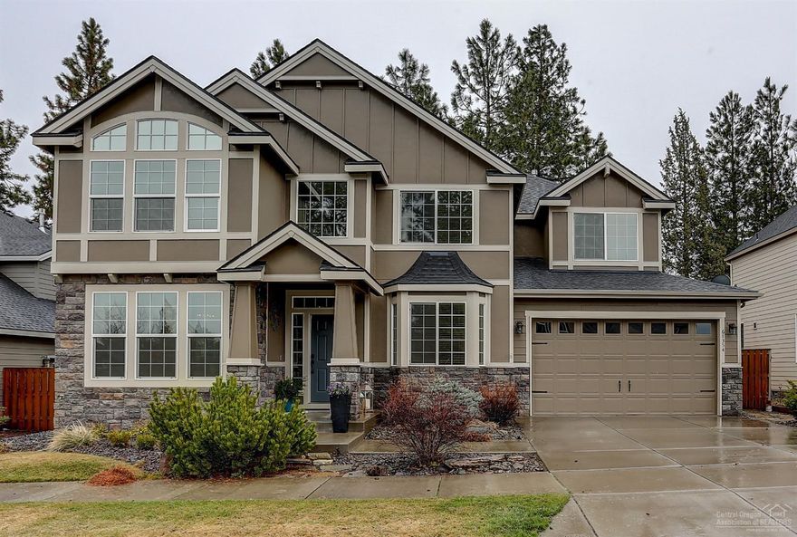 Gorgeous home in SW Bend in River Canyon Estates. Fully loaded: 4 bedrooms, great room, bonus room, den/formal living, office,3 full baths, all this and a 3 car tandem garage. Ideal setting across from open space/park and just a stone's throw away from the river walking trail. A chef's delight in this well-appointed kitchen with stainless steel appliances, massive island, solid quartz counter tops, and back splash. Stately Master suite with large luxury master bath. Ample storage throughout. Enjoy evenings under the large ponderosas in your hot tub or relaxing by the fireplace in the great room. Amenities include pool, tennis, 3 parks and clubhouse.