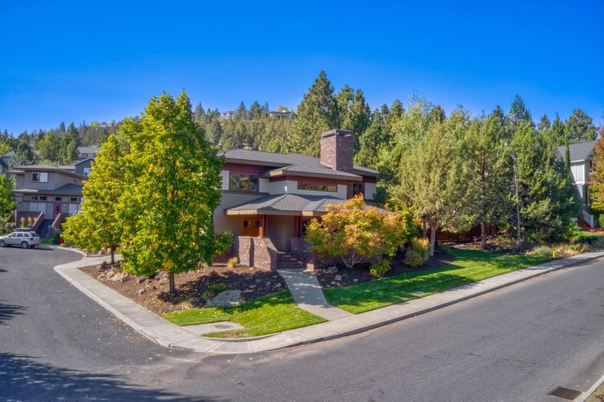 Stunning prairie-style home on a cul-de-sac in the desirable neighborhood of Awbrey Village. Freshly updated this year with new kitchen, bathrooms, hardwood floors,
carpet, interior paint in baths, fixtures and new roof in 2018. You'll love the open floor plan, vaulted ceilings, exposed wood beams, brick fireplace and several access points to expand living to the outside. This property also features a roughly quarter acre corner lot with expansive fenced backyard, mature tress, several covered outdoor living areas, and an oversized garage with storage/shop area. You've got to see this home! Seller is licensed realtor in the state of Oregon.