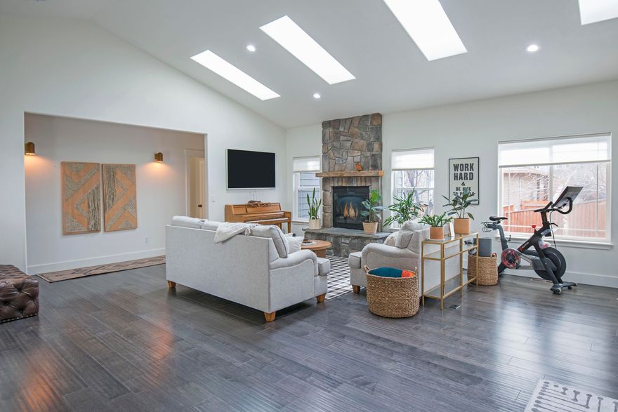 Incredibly updated, light & bright home in the lovely Elkhorn Ridge neighborhood. Close to it all; the Old Mill, connectors to the Deschutes River Trail, Pine Ridge Elementary and parks. All the updates have been done for you; a beautifully remodeled kitchen with all new appliances, farmhouse sink, gorgeous stone countertops. As well as fully updated bathrooms including a Japanese soaking tub in the primary bath and tiled showers and floors in both, new carpets in the bedrooms, solid wood doors throughout, new interior paint and featuring 4 skylights letting the light shine into the great room. Additionally a one-year-old hot tub on the back deck & an oversized garage for all of your toys. Downstairs you'll find a 300 sq.ft. bonus space that you can make your own. Make your move now to this gorgeous charmer.