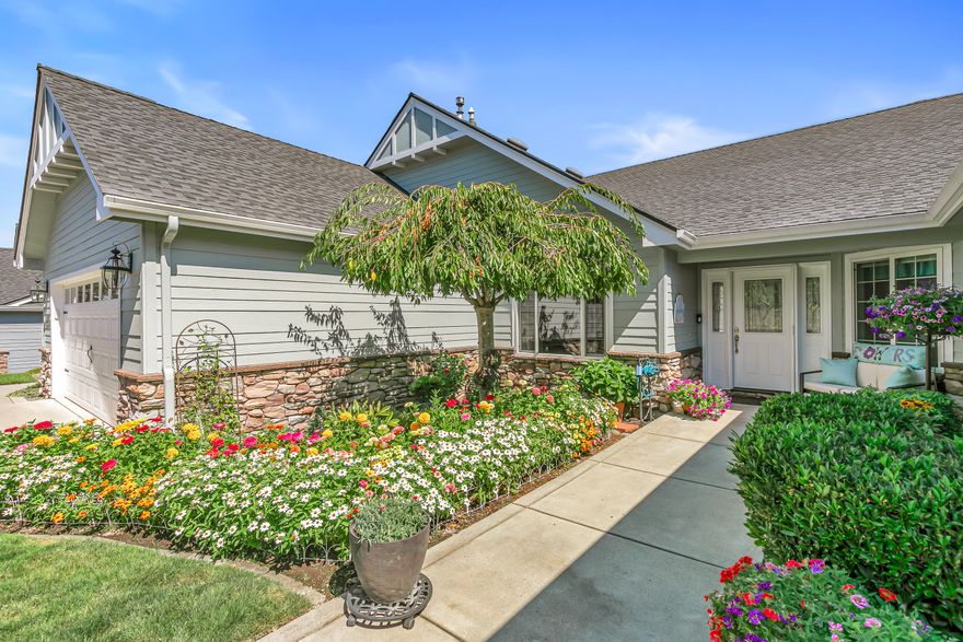 Exquisite 2-bed, 2-bath, 1,964 sq ft home in the gated Poppy Village HOA, nestled on the 14th green of Eagle Point Golf Course with stunning Mt. McLoughlin views! This 2003-built gem features vaulted ceilings, hardwood floors, and an open-concept living area bathed in natural light. The gourmet kitchen shines with new granite countertops, stainless steel appliances, and a spacious peninsula. Relax by the new gas fireplace or retreat to the refreshed primary bedroom with new carpet, paint, and a walk-in closet with spa-like ensuite. Enjoy elevated golf course views from the landscaped (artificial turf) backyard, the living areas or primary suite. Upgrades include a 2021 HVAC system, and a 2-car garage. Near top schools, parks, and shopping with easy downtown access. Move-in ready for $500,000—your dream home awaits in this prestigious gated community!