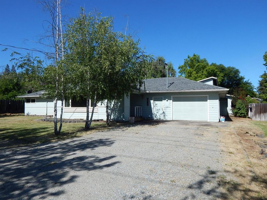 HUGE PRICE REDUCTION, seriously huge. Great project for a flipper or contractor. Home built in 1958; near Griffin Creek Elementary School, on .50 of an acre of land with a large shop; roll up door, 220 electric, concrete floor, RV barn; tall ceiling, 220, half bath. This is a solid, good boned house, just needs some loving. Being sold as is.