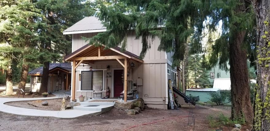 Fantastic fully remodeled home in the trees across from Harriman Springs at Rocky Point with some of the best lake fishing, canoeing, & bird watching around. Close to Crater Lake and 5 other mountain lakes! This 2 bedroom, 2 bath homes also includes a 1 bed, 1 bath guest home and has an extra tax lot. The main home has been completely remodeled with new kitchen hickory cabinets, granite counters, new bathrooms with tile showers, wood vinyl plank floors in main area, carpet in bedrooms, updated plumbing, newer interior & exterior paint, stamped poured concrete porches & walkways and so much more! Right across the street is a new lake resort with full service beautiful restaurant and bar, and a marina with boat rentals. What a great community with several other small resorts nearby and Lake of the Woods just minutes away! Could be used as a vacation rental or your home away from it all!