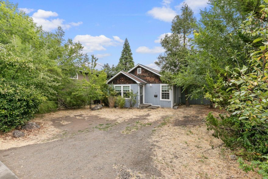 Adorable cottage style home with 3 bedrooms, 1 bath and 1,225 SqFt! Great opportunity for first time home buyers or someone looking for an investment. This home features vaulted ceilings, hardwood flooring, 2 skylights in the master bedroom with doors leading to the large fenced backyard and the front bedroom also has a private entrance through the front yard. In the backyard there is a structure that could be used as storage or turned into an art studio/etc. County sqft is listed at 1,140, home has been measured by West Coast Images (see attached floor plan) and measures at 1,225 sqft. Buyer Shall do their own due diligence. You don't want to miss out on this home! Come see it today before it's gone!