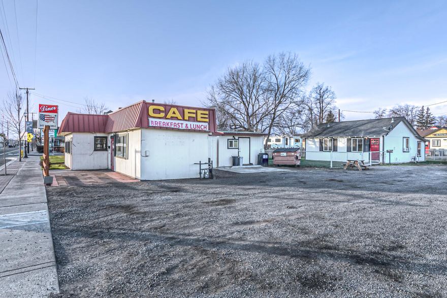 This is a great opportunity to invest in booming Redmond! This property has both a home and a restaurant with great visibility on 6th St, the main South bound route thru the downtown core business district. Some recent upgrades include: new flooring in the home, new furnace & grill in the restaurant, updated plumbing, & newer roofs on both buildings. There are 2 outbuildings for plenty of storage and ample parking for tenants & guests. In the restaurant you'll find a large walk in refrigerator and a fully functioning kitchen along w/ tables & chairs. Owner will carry! Call Listing Agent for terms. Projected 5% cap rate. Don't miss out on this property!