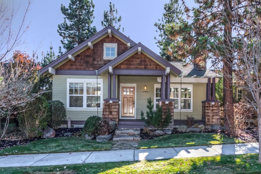 Classic Northwest Crossing single level cottage. Craftsman style with pergola over the front porch. Living room has a vaulted ceiling, cozy gas fireplace with built-in book cases, sand-In-place oak hardwood floors. An arched opening leads to the dining area and the Island kitchen with stainless steel appliances and white cabinets. Office/den at the front of the home with views of trees and lawn In the front yard. Stylish guest bathroom with tile counter tops and floor. Primary bedroom at the rear of the home with walk-in closet Master bath with dual vanities, tile counters and floors, soaking tub and tile shower. Private fenced yard with covered deck and paver patio. Attached 2 car garage w/ rear alley. Energy efficient with Earth Advantage Gold Certification.