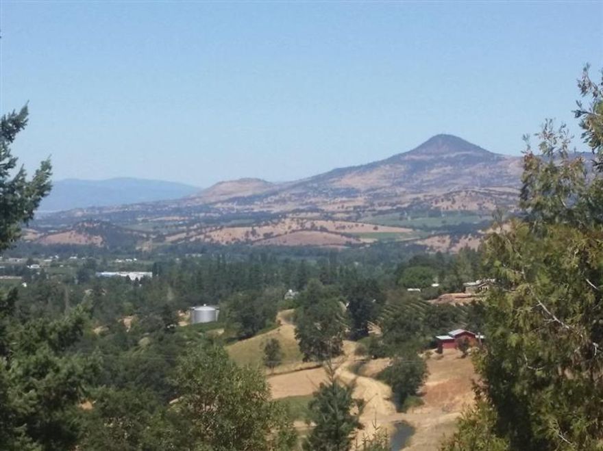 One of kind Vineyard / Estate property! Gorgeous valley & mountain views from this secluded, knoll top property. 360 degree views from Anderson Butte to the Table Rocks, home site is in and site is build ready. Owner just had previous home completely cleared and property has been cleaned up. I have never seen such a beautiful property in the Rogue Valley, 10 acres are irrigated & zoned EFU. Build your dream home and plant some grapes. 15 minutes to Ashland and close to everything. 2.5 miles to the I-5. This is a don't miss opportunity to build your dream home!