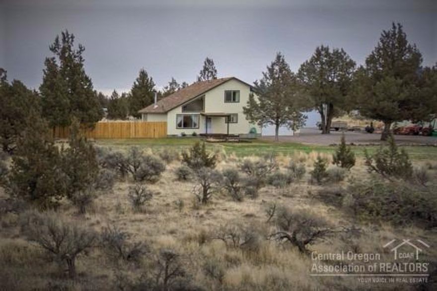 Enjoy Cascade Mtn Views on the very edge of CRR. Just a few miles from Terrebonne amenities, this 5+ acre property can be yours for the Holidays! 3 bedrooms & 2 newly redone bathrooms, huge closets. Main level Master & mudroom/laundry. Wood burning fireplace will keep you cozy all winter long in this 2 story open great room. Attached oversized single car garage PLUS a Brand NEW 36'x36' shop with dual 12' doors. Insulated, finished & move in ready w/concrete slab floor & man door. Fenced areas for pets!