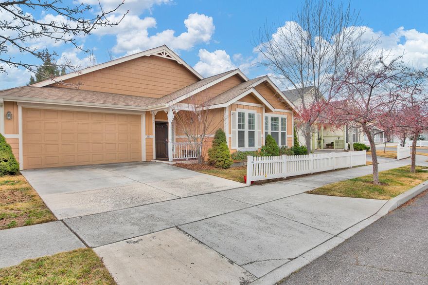 Fantastic and charming single level in the Cottage Canyon 55+ area of Holliday Park. Great NE location close to shopping, hospital, doctor's offices and eateries! Lovely covered front porch and formal entry. Enjoy the open great room with fireplace, dining area and kitchen with breakfast bar. Great separation of bedrooms with one side of home featuring a primary suite (with specially built walk in tub) and a guest bedroom + 1/2 bathroom. Another primary suite is located on opposite side near laundry space. Nicely landscaped, fully fenced, with AC in a wonderful tree-lined neighborhood!