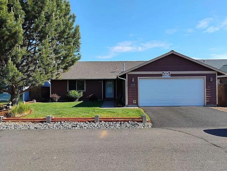 Move-In Ready Gem with Room to Grow! Discover this welcoming 4-bedroom, 2-bathroom home that combines comfort, functionality.

Step outside and you'll find a spacious yard with both front and back fenced areas, perfect for pets, play, or gardening. The generous back deck sets the stage for summer BBQs and gatherings, while the front yard boasts a convenient sprinkler system to keep it green and vibrant. Storm doors on both entrances add an extra layer of security and seasonal comfort.

Move-In Ready—Minimal Effort, Maximum Enjoyment Come home to ease, space, and value.