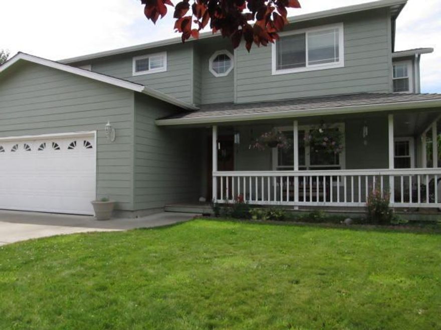 Super desirable location close to Griffin Creek elementary and the new South Medford High. Home features hard to find 4 XL bedrooms with plenty of light and windows with views, fireplace, large formal dining room, separate family and living room, engineered floors, covered back porch, lots of custom touches, french doors, and much more. Don't miss relaxing on the wrap around front porch and large private backyard. Priced for a quick sale - don't miss touring this gem!