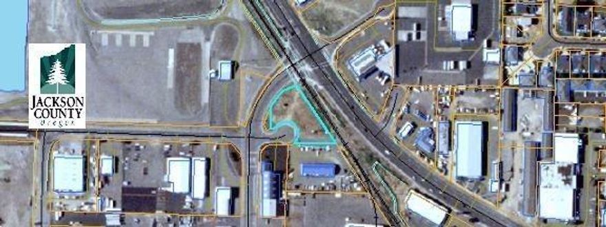 Next to the intersection at HWY 99 and Sage Road, this high traffic exposure property is ideal for a business. Zoned GI (general industrial) allows for several applications. Great for an auto or truck repair shop, warehouse, manufacturing, etc. Property is enclosed with cyclone fencing but feel free to drive by and see it for yourself.