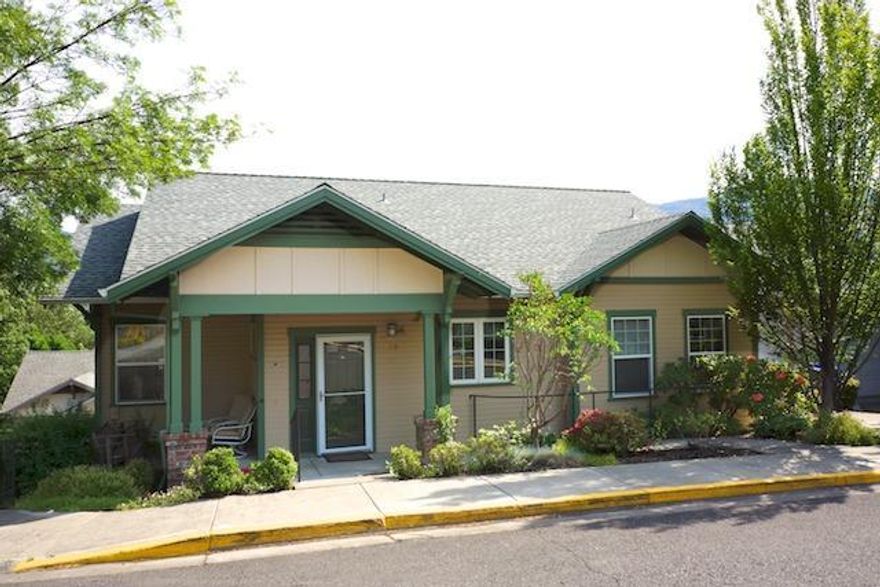 Location, Location and views too! Top floor condo with amazing views of Ashland and hills. Large windows for natural light and to bring the outdoors in. Balcony and front porch to enjoy those spring and summer evenings. Very close to the community clubhouse and dining room. Attached one car garage and workshop area plus windows in the garage too. Kitchen with newer counter tops, new vinyl and window blind. Carpet recently replaced as well. Great opportunity to own an upper level unit of the area most people know as over/unders a unique style of condo that looks like a duplex but feels like a single family home. All this plus a community garden, 4 acre park, fitness center, dining room and clubhouse at Ashland's only 55+ resort community - Mountain Meadows.