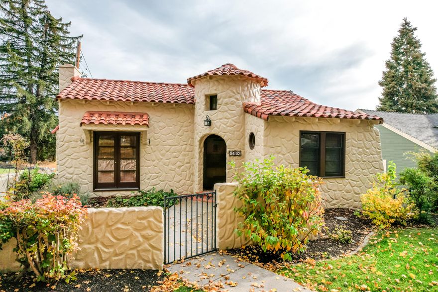 Discover this storybook 3-bedroom plus office, 2-bathroom home with 1,617 sq ft of living space in the sought-after Pacific Terrace neighborhood of Klamath Falls. With unique character and thoughtful upgrades, this property offers comfort, style, and exciting potential. A private primary suite on the lower level provides plenty of space and a flexible layout with the opportunity to convert into two separate units. The tile roof was replaced in 2022, and the geothermal well & heating system has been upgraded. Step outside to the expansive deck with city views, a Fenced Backyard, a 1-car tandem garage providing room for 2 cars if needed,  & additional storage space. Close to parks, schools, and downtown amenities. This home is perfect for buyers seeking character, comfort, and future growth. Whether you're looking for a cozy residence or a smart investment, this property delivers