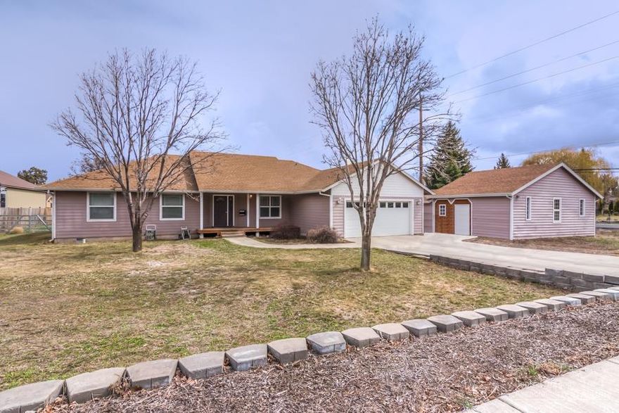 This custom-built single level home has lots of elbow room inside & out. With large rooms & vaulted ceilings you will love the big living room & the spacious kitchen where you have a breakfast nook & a formal dining area. Huge master with jetted tub, separate shower, double sinks & walk-in closet. Large secondary bedrooms too! A big utility room has a sink & a bath & lots of cabinets. Double attached garage & for the hobbyist or craftsman there is a 20x30 shop with heating/cooling, 220 power & a 12x22 storage area. This 1/2 acre lot allows for RV parking, an ADU,RV barn or perhaps spinning off another lot.