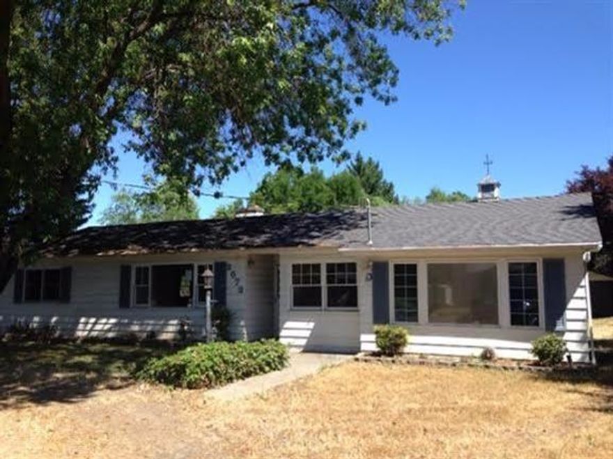 Fantastic 3 beds/2baths home on private setting big .32 acre lot. Large shade trees front and back. Double carport, RV parking and a spacious workshop. Private well for irrigation and city water for sprinkler system and home. Home is set back with nice circular driveway.