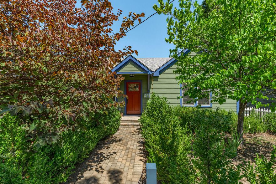 Charming and cozy with a white picket fence! Main house is a 1940's Cottage-style home that was completely taken down to the studs for an extensive renovation in 2013. Two bedrooms and one bath, just shy of 1000 square feet. Quality amenities and finishes throughout including Douglas fir floors, Simpson Douglas fir doors, solid surface countertops and custom cabinetry in the kitchen and a stylish tiled bathroom. Main house has two off-street parking spots (tandem) a lovely landscaped front yard and raised garden beds in the back. In addition, there is a detached 480 SF ADU built in 2012. One bedroom, one bath, open kitchen and living room area with concrete radiant heat floors throughout. ADU has one designated parking spot and an additional guest parking from alley access. This is a treasure of a property with an ideal close to downtown location.