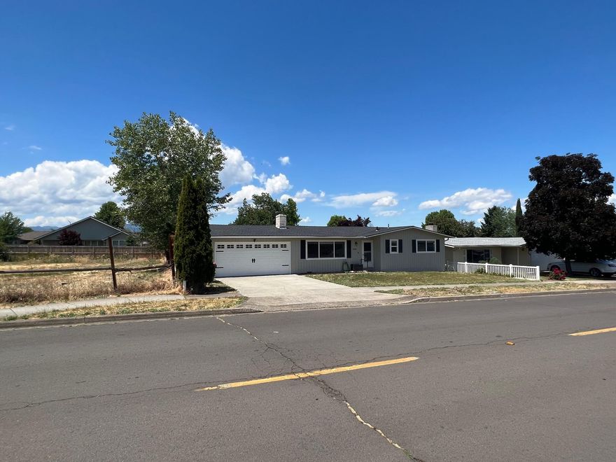 Come see this charming single-level home with so much potential! The home has been tastefully updated with S/S appliances, new flooring, lighting and much more. The covered patio allows you to enjoy warm summer days or get cozy in the winter by the indoor woodburning fireplace. Located in a desirable neighborhood, don't miss out on this rare gem.