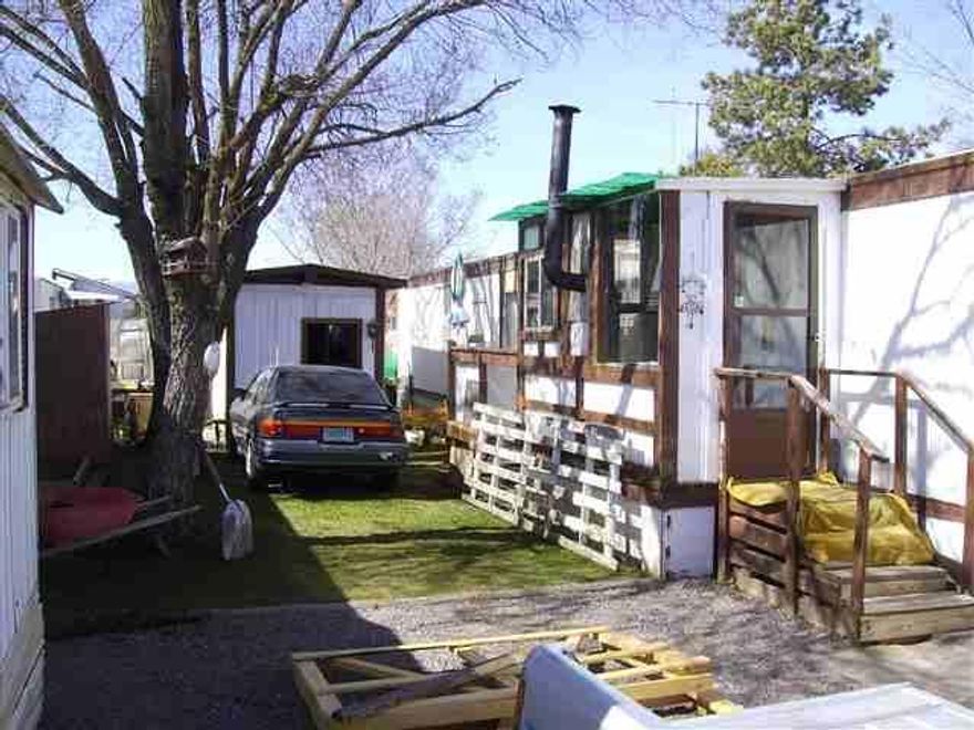 Well Maintained Older Mobile Home In A Park With Space Rent Of Only $260 Per Month. Has Storage Utility Building And Covered Enclosed Porch. Owner Motivated, Moving To Iowa.