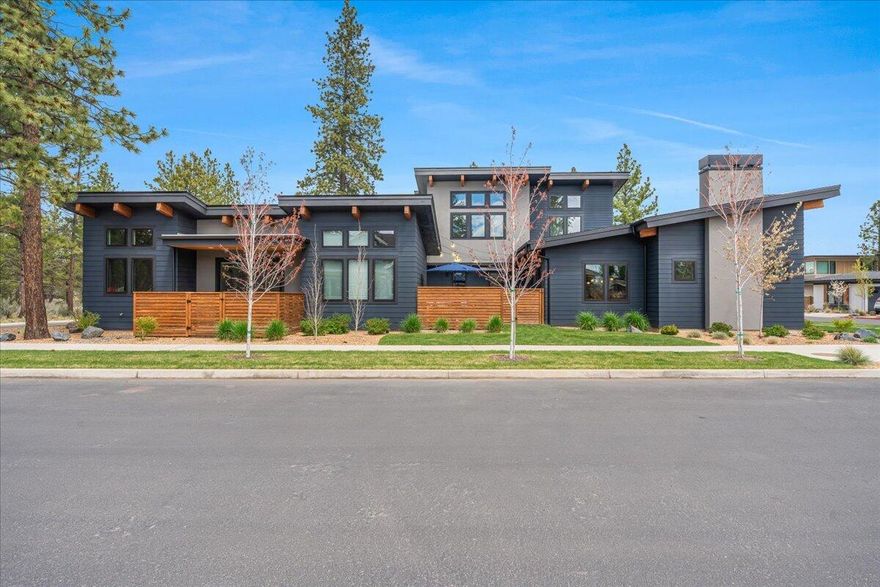 Welcome to this stunning 2,962 sq ft home located on a desirable corner lot in Discovery West. This thoughtfully designed property features 3 bedrooms and 2.5 baths in the main home, plus a separate 1 bedroom, 1 bath ADU, perfect for guests, rental income, or multi-generational living. The home showcases modern elegance with high-end finishes throughout, blending style and functionality seamlessly. The open-concept layout offers abundant natural light, a gourmet kitchen with premium appliances, and a spacious living area ideal for entertaining. The luxurious primary suite provides a serene retreat with a spa-like bath and walk-in closet. Additional highlights include a 3-car garage with an RV bay, perfect for your recreational toys or extra storage. Enjoy the best of Bend living in this sough-after neighborhood, close to parks, trails, and all that Discovery West has to offer.