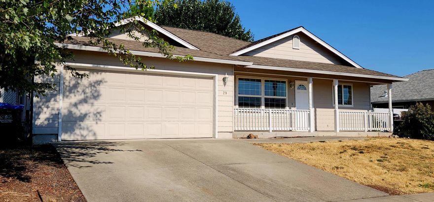 OPEN HOUSE this SUNDAY from 1:00 to 3:00.  Are you looking for a great home, at a great price?  This just might be the one for you!   Tucked away on a dead-end road with only 11 other homes, this property offers convenience as it is located close to Wal-Mart, Rays and Eagle Point High School.  Featuring 3 bedrooms and 2 full bathrooms, the home has a light, bright and airy feel thanks to the vaulted ceilings and large windows that let in the natural light.  You'll love the open-concept layout, perfect for entertaining or simply relaxing at home.  The kitchen offers great counter space and storage.  Outside, enjoy a fully fenced backyard with a mature tree, room to garden, play, BBQ, or simply unwind on the covered patio. Whether you're a first-time home buyer, downsizing or investing, this home checks all the boxes.  Call today for a private showing. You will be glad you did.