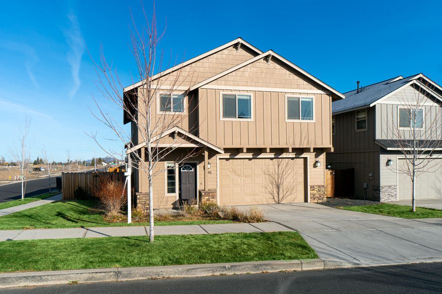 Don't miss this like new home on a large corner lot in one of Redmond's premier neighborhoods, Fieldstone Crossing. Open floorplan w/ laminate flooring throughout main living area, plenty of space for entertaining & kitchen that features Spanish Oak cabinets, Quartz slab counter tops, all Stainless appliances. 4 bedroom, 2.5 bath, 2,518 sf of living space. Lg great room features cozy gas burning fireplace w/ decorative stone surround that opens to large dining area & kitchen w/ huge eating bar kitchen island. Home was previously an upgraded model home so it has all of the original seller upgrades w/ under cabinet lighting, soft close cabinetry, full length primary bedroom closet mirror, tons of cabinetry & sink in laundry, plus more! New carpet, gas forced air w/high efficiency furnace, A/C! Attached double car garage. Landscaped w/ auto sprinklers & fully fenced.