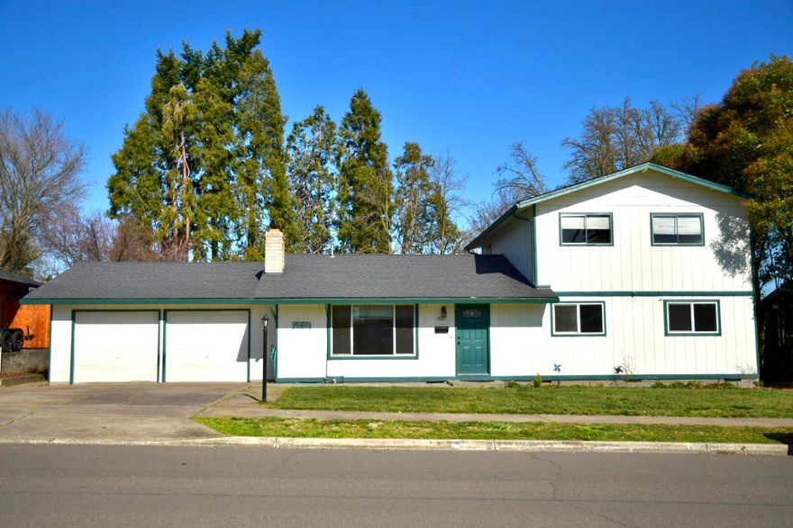 Come check out this lovely home with many recent upgrades!  New carpet, new tile, new interior doors and hardware, updated landscaping and fresh paint; both inside and outside!  Lots of counter space and storage in the kitchen with a dining area, living room and separate family room.  Downstairs bonus room can double as a bedroom or office.  Centrally located near hospitals, shopping, and schools.  Great potential multi family set up as well.  Come see the great layout for yourself!