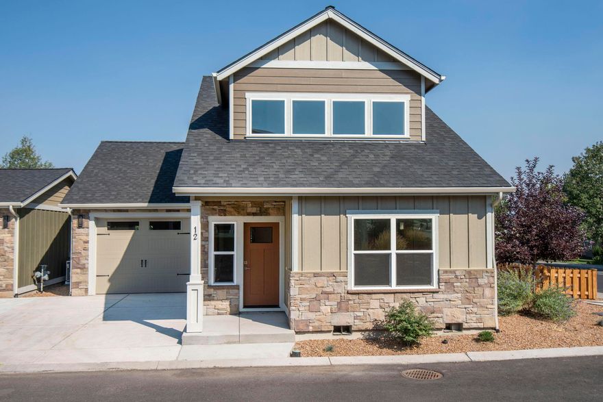 Ask about the incentives when working our preferred lender!  Owner carry terms also available. Check out this gorgeous home at The Greens in Redmond. Golf course and pond views abound. This quality home built by Talmage Construction features higher finishes such as luxury vinyl plank flooring, solid surface counters, full height backsplash and more.  Main level living with the primary suite on the ground floor. The garage has a vaulted ceiling, poviding so much storage for your Central Oregon toys.  This home is just a few minutes from downtown Redmond or the airport. And, it's SW location makes it an easy 20 minute drive into Bend. Come experience this quiet little community tucked in next to the golf course.  Whether for your full time residence, or your home away from home, you will love this corner lot and location.