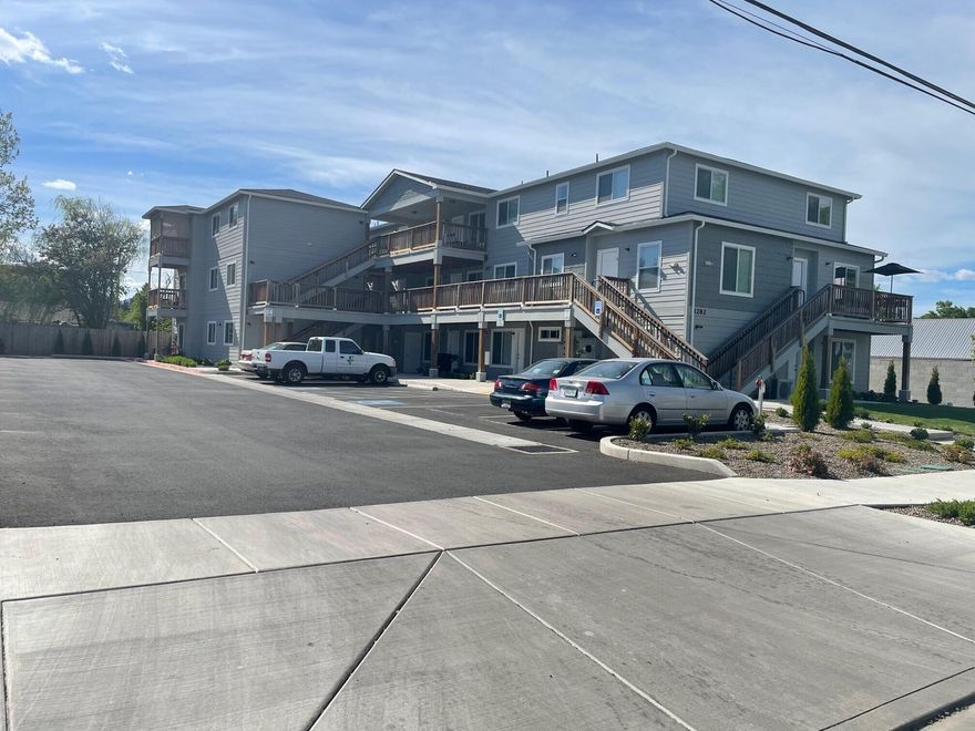 INVESTOR ALERT!! Incredible opportunity to own a 2019 built apartment complex w/ 14 units in a great central location! Four units are 3 bed, 2 bath ''townhome style'', three are center unit flats offering 2 bedrooms & 1 bathroom; three are the ''annex'' flats- 2 bed, 1 bath; & four are corner units offering 1 bedroom and 1 bathroom. Great floor plans & close proximity to restaurants, medical, shopping and the main bus route.