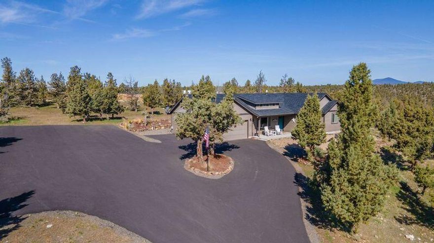 Must see this unique property to truly appreciate. Enjoy serenity and mountain/valley views from this updated, stick-built home on nearly two acres in desirable High Desert Estate. Just minutes from both downtown and the reservoir, yet quiet, private and a wonderful setting for entertaining and family gatherings. Stainless steel kitchen appliances and new cabinetry in both bathrooms. Newly paved asphalt driveway with two entrances and an abundance of parking for vehicles and/or toys. Recent tilework (kitchen & both baths), interior repainted and privacy fencing (All completed in 2022). Woodshed (10'w x 20'l) and carport (20'w x 30'l x 14'h) included.