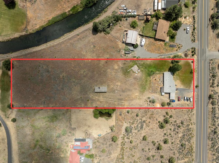 Discover potential on this 2.28-acre property in SE Bend, offering 2 acres of irrigation rights and partial mountain views. Whether you're ready to restore the existing home or build a custom dream retreat, this is a rare opportunity in a peaceful setting. The property features Avion water, a 26,000 gallon cistern, and a 2021 pellet stove insert. Bring your vision and make the most of this scenic and spacious property!