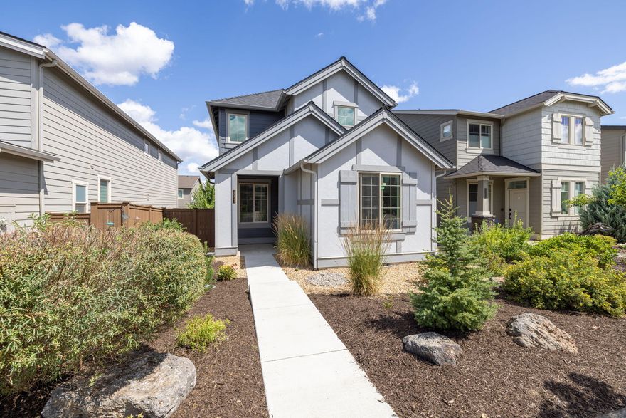 Welcome to The Bridges, Bend's premier Southeast master planned community.  This stylish home includes a dedicated front den, perfect for an office of flex space.  The open-concept great room features a cozy gas fireplace and flows seamlessly into a gourmet kitchen with stainless gas appliances, quartz countertops, and a generous island with breakfast bar.  Upstairs you can find a versatile loft area, a convenient laundry room, and three bedrooms including the primary suite.  Enjoy a covered front porch, side yard with newer trex deck, plus a 2-car attached garage.  The Bridges Community offers resort-style living with with 2 outdoor pools, indoor basketball court, fitness center, clubhouse, game room, walking trails, and 15+ acres of green space.  And a bonus with Alpenglow Park, a 37-acre community park, just steps away, featuring a splash pad, bouldering area, off-leash dog park, and trails.