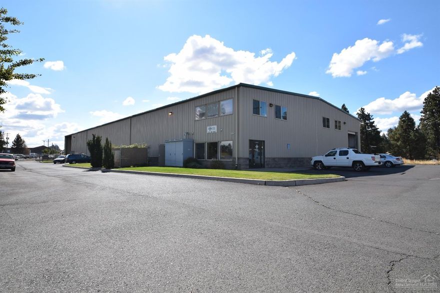 This 17,100 +/- SF metal industrial building on a 32 CMU base sits on 1.36 acres of land zoned Industrial General (IG). The property is adjacent to a rail spur in Bend's south industrial area. The property includes two (2) fourteen foot (14') roll up doors, two (2) ten (10) foot roll up dock high doors at grade, multiple man doors, first and second level office space with showroom and employee break room, and the building is a clear span of 85' in width and 200' in length.