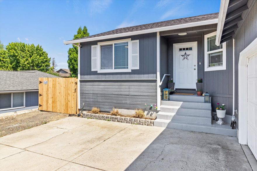 This well-maintained, single-story home offers tasteful updates and comfortable living throughout. The open-concept great room features new plank flooring and ample natural light, creating a welcoming space for both relaxing and entertaining. The kitchen flows seamlessly into the living and dining areas, while the freshly landscaped front yard and updated interior paint enhance the overall curb appeal. With 3 bedrooms, 2 bathrooms, and 1,304 sq ft on a .17-acre lot, this home is move-in ready and offers a functional layout for a variety of lifestyles.